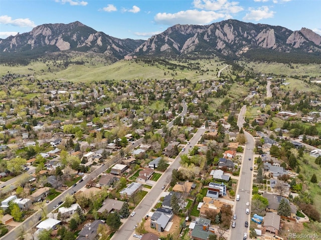 drone / aerial view with a residential view and a mountain view