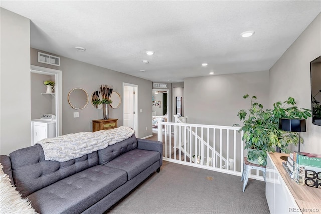 3778 Happyheart Way, Castle Rock, CO 80109 - carpeted living area featuring washer and dryer, recessed lighting, and baseboards