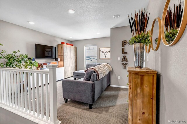 3778 Happyheart Way, Castle Rock, CO 80109 - carpeted living area with recessed lighting, baseboards, and a textured ceiling