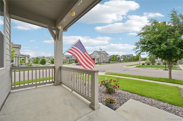 12854 Clearview St, Firestone, CO 80504 - covered porch featuring a residential view
