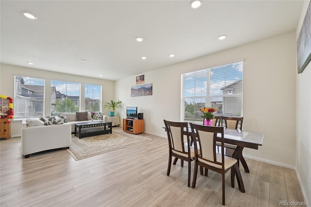 12854 Clearview St, Firestone, CO 80504 - dining area with light wood finished floors and recessed lighting