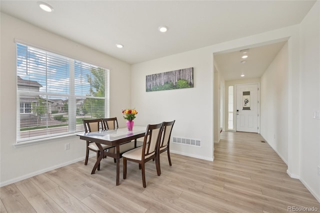 12854 Clearview St, Firestone, CO 80504 - dining room featuring light wood-type flooring and recessed lighting