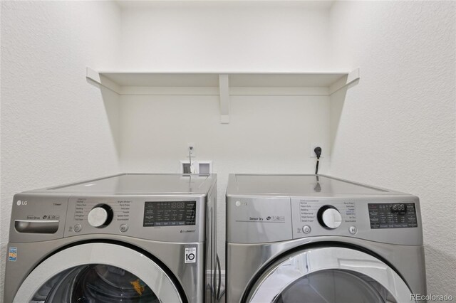 12854 Clearview St, Firestone, CO 80504 - washroom featuring washer and dryer