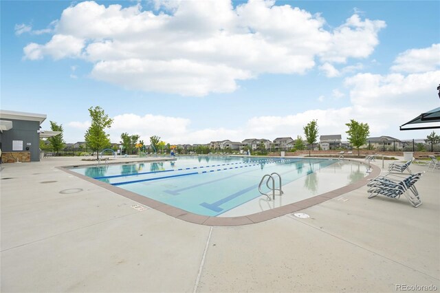 12854 Clearview St, Firestone, CO 80504 - community pool featuring a patio area