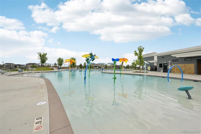 12854 Clearview St, Firestone, CO 80504 - community pool featuring a water play area