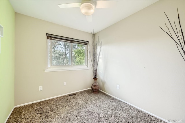 carpeted empty room with ceiling fan