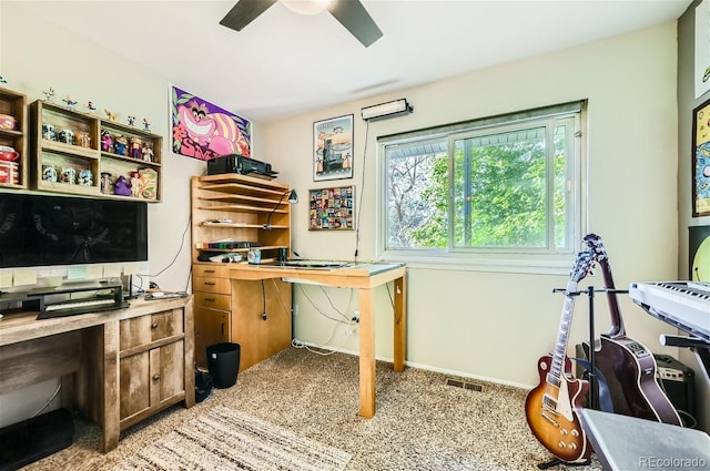 office space featuring light colored carpet and ceiling fan