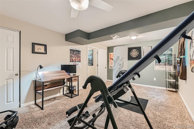 exercise area with carpet floors and ceiling fan