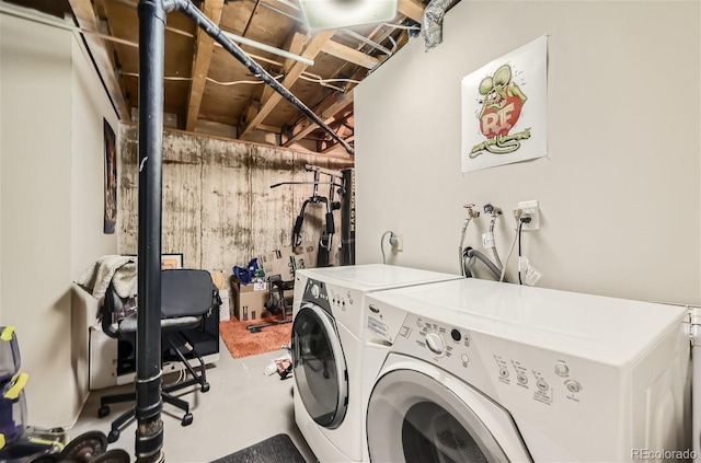 laundry area with separate washer and dryer