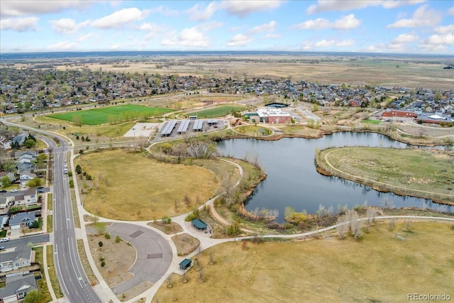 aerial view with a water view and a residential view