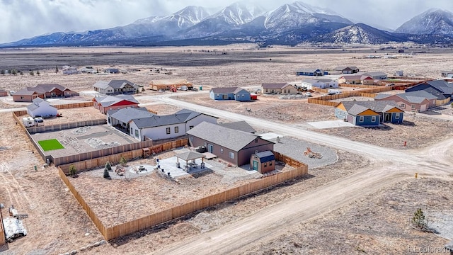 drone / aerial view with a residential view and a mountain view