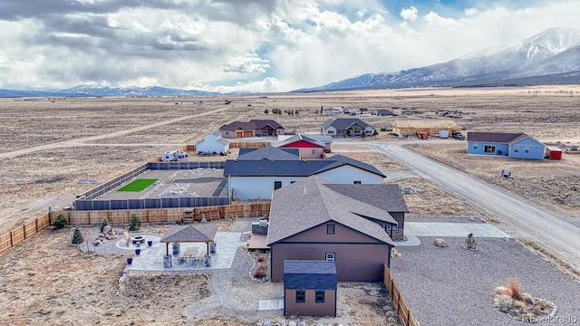 bird's eye view with a mountain view