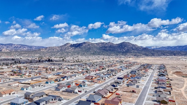 aerial view featuring a residential view and a mountain view