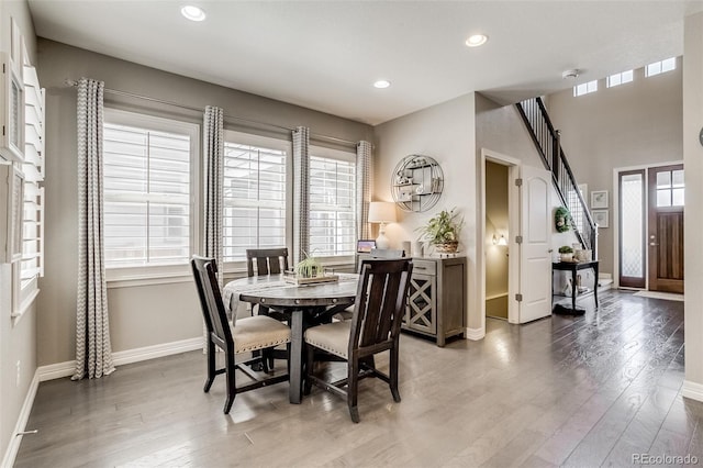 8444 E 55th Pl, Denver, CO 80238 - dining area with baseboards, recessed lighting, and wood finished floors