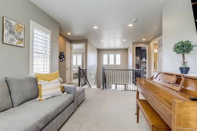 8444 E 55th Pl, Denver, CO 80238 - carpeted living room featuring recessed lighting
