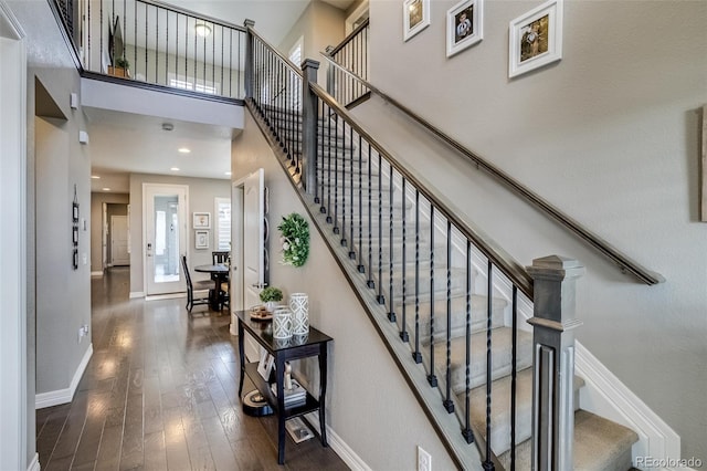 8444 E 55th Pl, Denver, CO 80238 - stairway with hardwood / wood-style flooring and a high ceiling