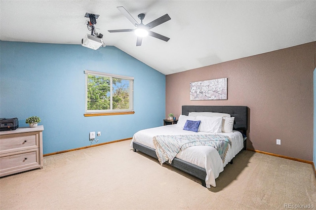 12261 N Holly Way, Brighton, CO 80602 - bedroom featuring vaulted ceiling, carpet flooring, baseboards, and a ceiling fan