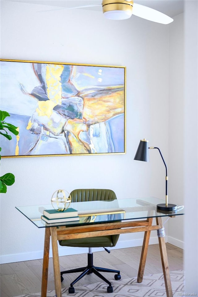 office space featuring breakfast area and hardwood / wood-style flooring