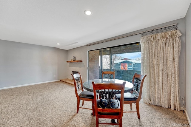 dining area featuring recessed lighting, carpet flooring, and baseboards