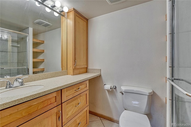 full bathroom featuring visible vents, toilet, vanity, tile patterned flooring, and tiled shower