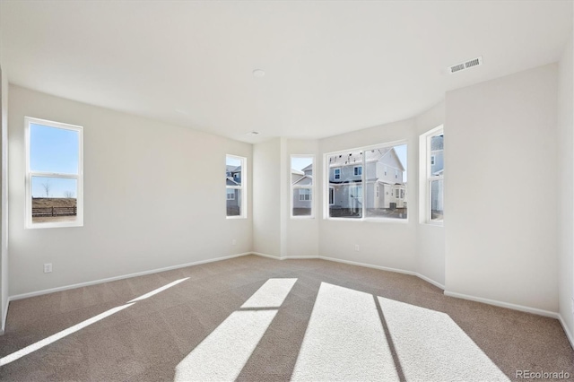 view of carpeted spare room