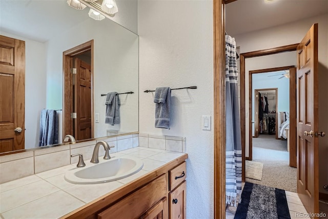 1361 Bross Ct, Evergreen, CO 80439 - full bathroom featuring vanity and a ceiling fan