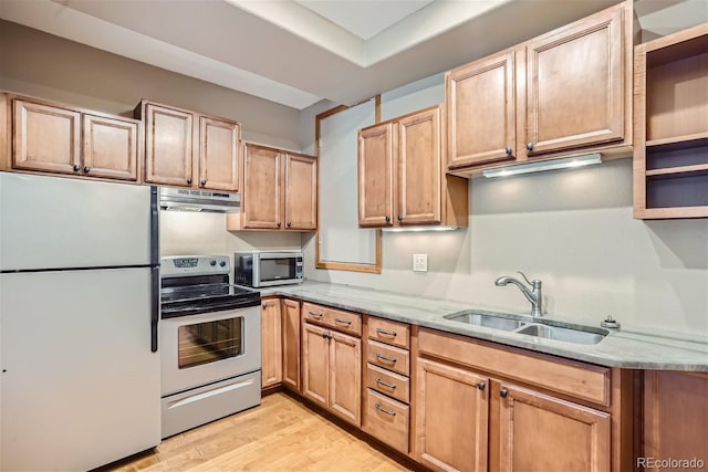 1361 Bross Ct, Evergreen, CO 80439 - kitchen with appliances with stainless steel finishes, under cabinet range hood, light wood finished floors, light stone counters, and open shelves
