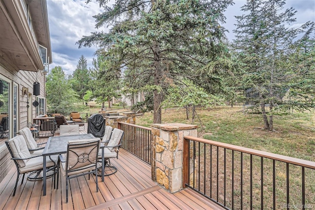 1361 Bross Ct, Evergreen, CO 80439 - wooden deck with outdoor dining area