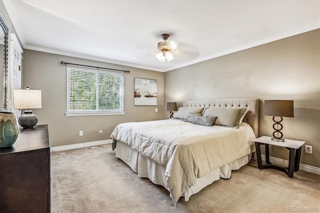 bedroom featuring baseboards, ornamental molding, a ceiling fan, and light colored carpet