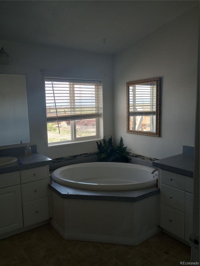 5511 Ridgetop Ct, Alamosa, CO 81101 - bathroom with vanity and a garden tub