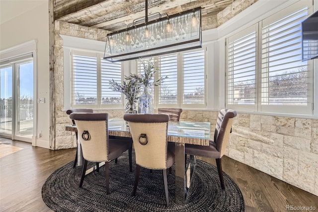 dining area with dark hardwood / wood-style flooring