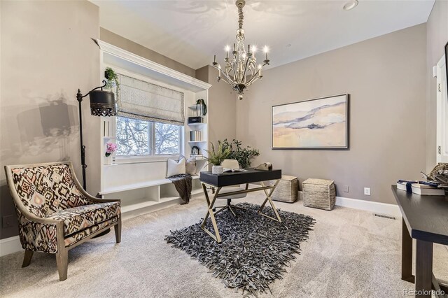 office featuring carpet flooring and a chandelier