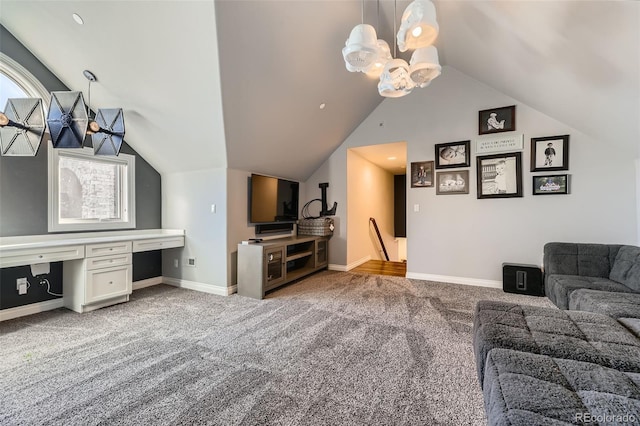 carpeted living room with lofted ceiling