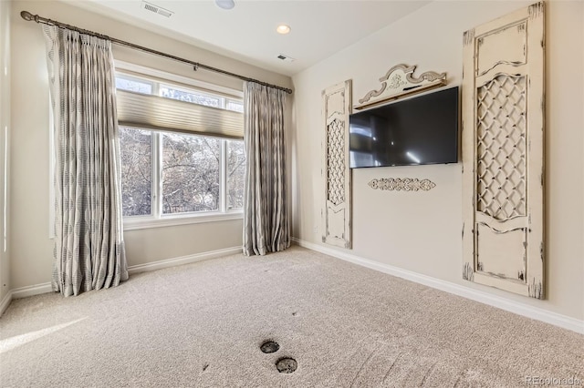 view of carpeted spare room