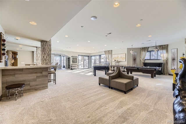 interior space with light colored carpet and billiards