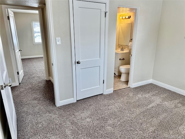 bathroom with sink and toilet