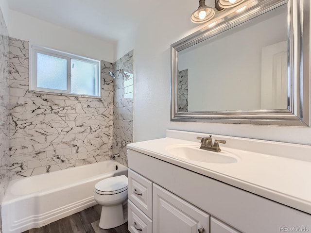 10736 Logan Ct, Northglenn, CO 80233 - full bath featuring vanity, shower / bath combination, and wood finished floors