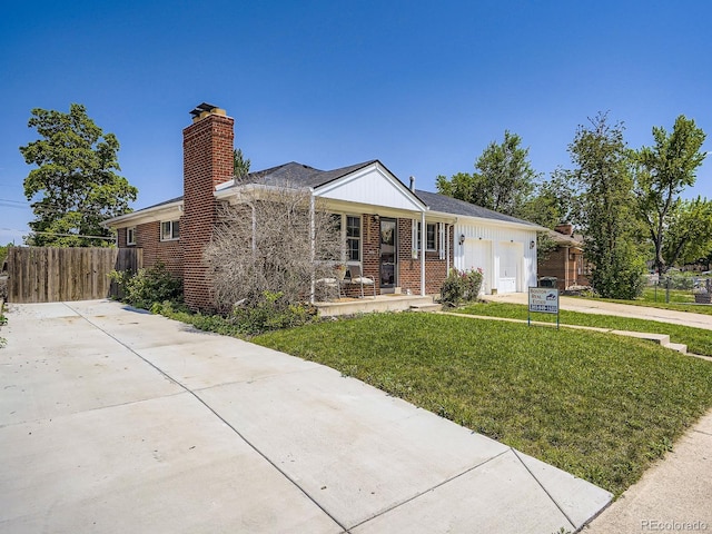 10736 Logan Ct, Northglenn, CO 80233 - ranch-style house with driveway, a garage, brick siding, a chimney, and a porch
