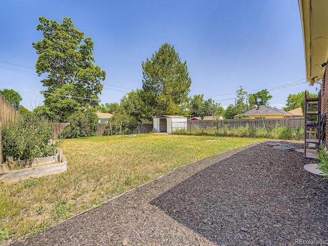 10736 Logan Ct, Northglenn, CO 80233 - fenced backyard with a vegetable garden and a storage unit