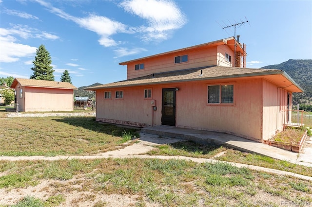 13705 County Road 45, Coaldale, CO 81222 - rear view of property featuring a lawn