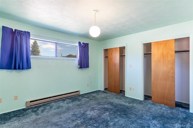 13705 County Road 45, Coaldale, CO 81222 - unfurnished bedroom with baseboard heating, multiple closets, and carpet flooring