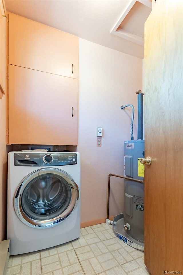 13705 County Road 45, Coaldale, CO 81222 - laundry area featuring water heater, stacked washer and clothes dryer, and light floors