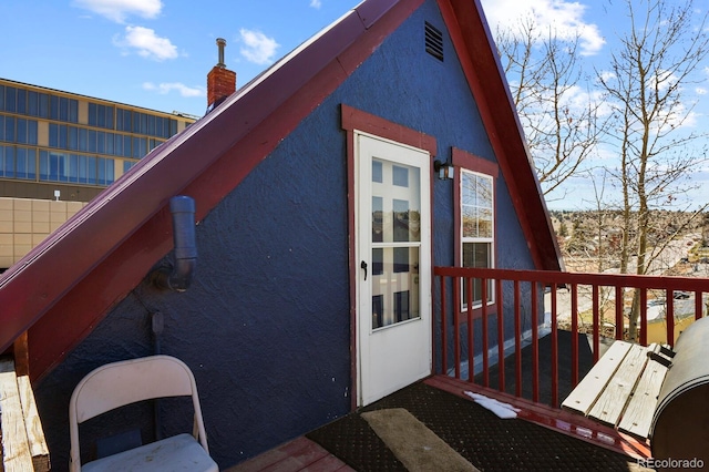 exterior space featuring a wooden deck