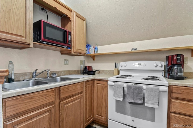 kitchen with sink and electric stove