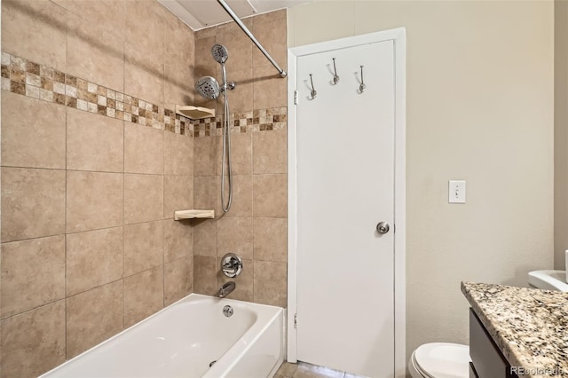 full bathroom featuring  shower combination, vanity, and toilet