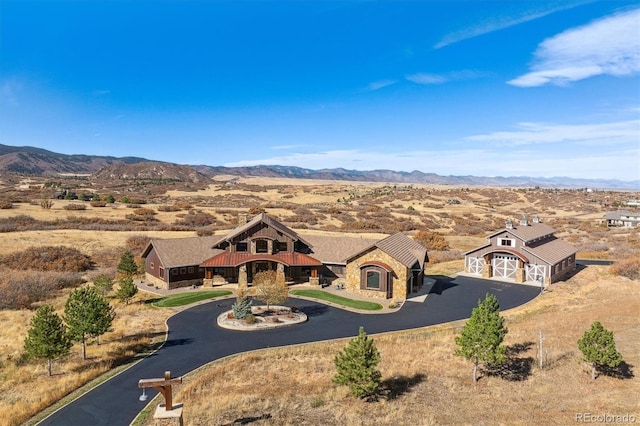 bird's eye view with a mountain view