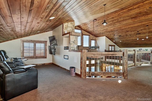 living area featuring vaulted ceiling, carpet flooring, and plenty of natural light