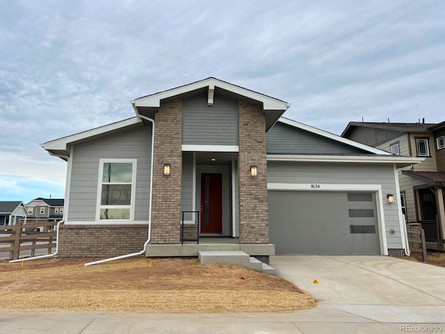 view of front of property featuring a garage