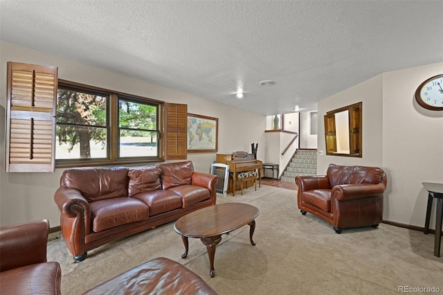17852 E Long Ave, Centennial, CO 80016 - carpeted living area featuring a textured ceiling and stairway