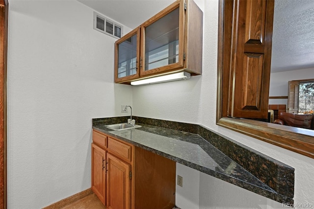 17852 E Long Ave, Centennial, CO 80016 - bathroom featuring vanity, a textured ceiling, and a textured wall
